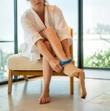 Steve glide dolphin putting on compression stockings